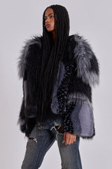 Oksana Patchwork Faux Fur Coat in Black